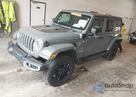 2021 Jeep Wrangler 4Xe Unlimited Sahara 4X4 z USA, uszkodzony, nr VIN 1C4JJXP6XMW784100